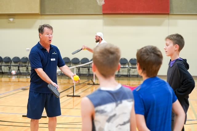 Youth pickleball instruction session